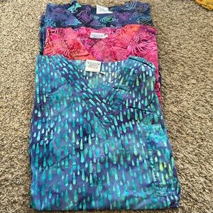 3 XS crazy scrubs tops.